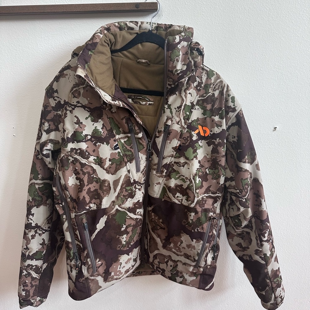 First Lite Solitude Jacket with Bold Orange Logo